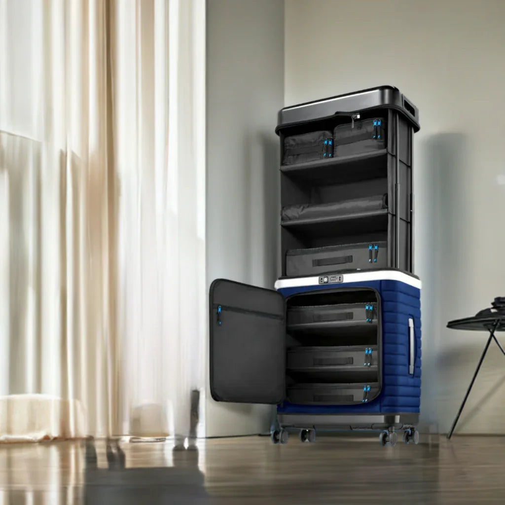 Pull Up Suitcase blue in a hotel room – open position next to armchair and curtain