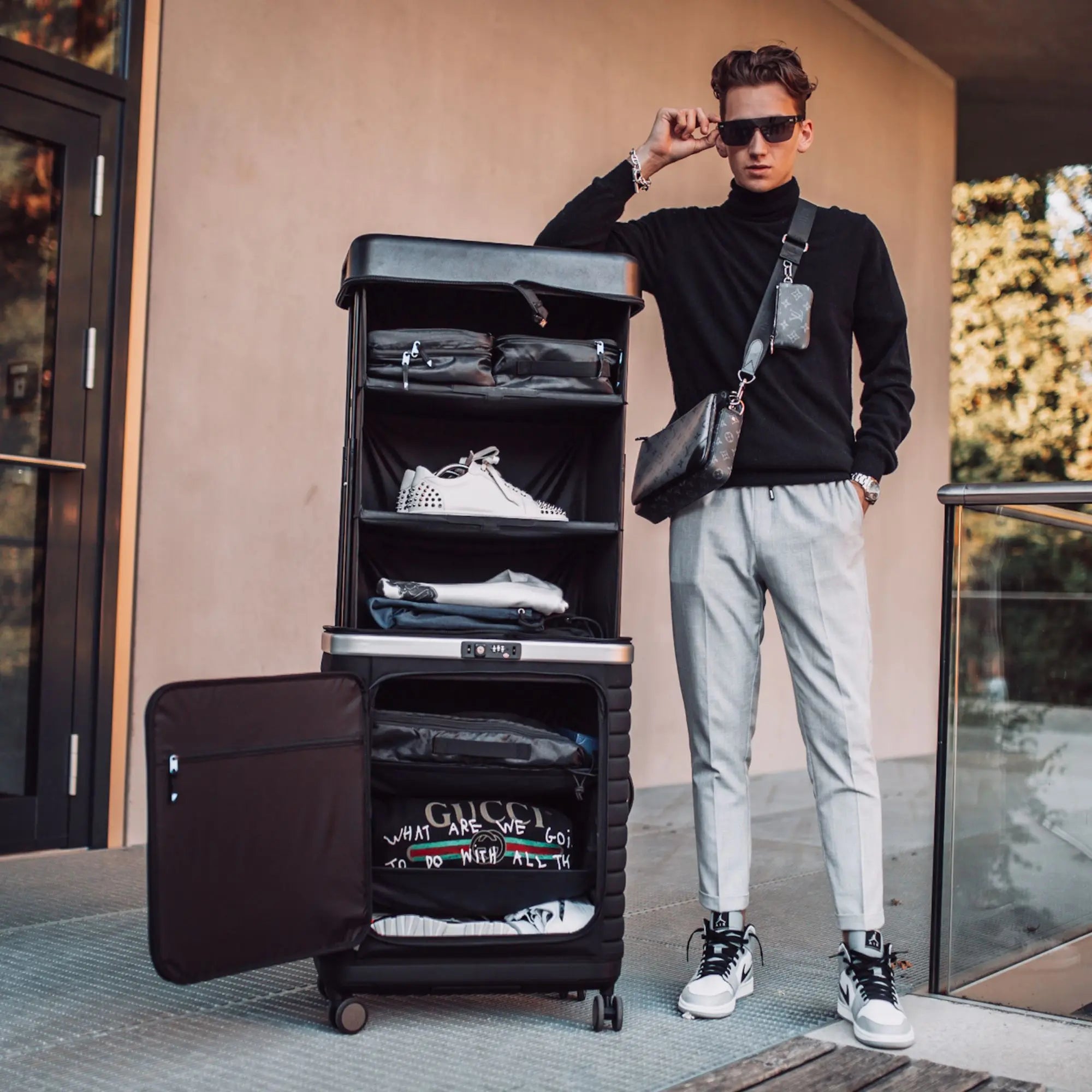 Pull Up Suitcase with fold-out compartments open